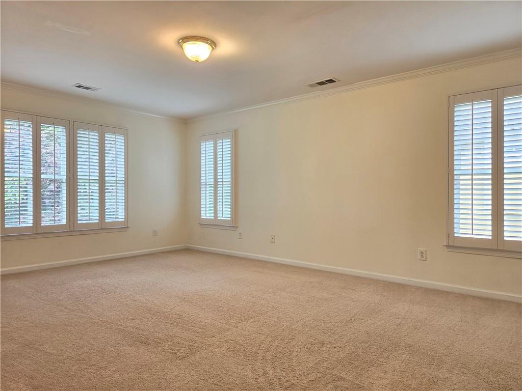3715 Ridgeside Court Suwanee, GA 30024 - Photo 23 of 44 an empty room with a window