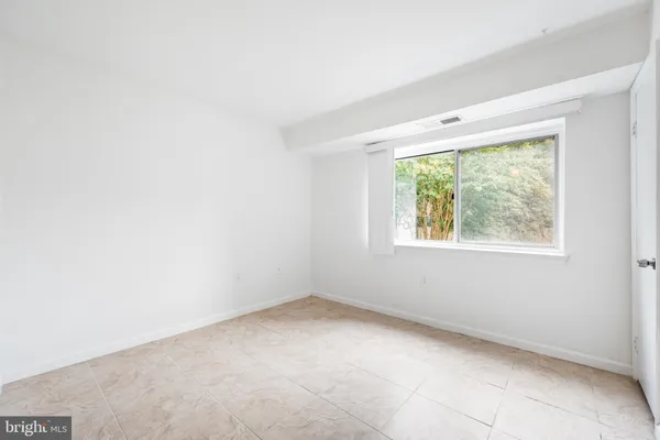 an empty room with a window