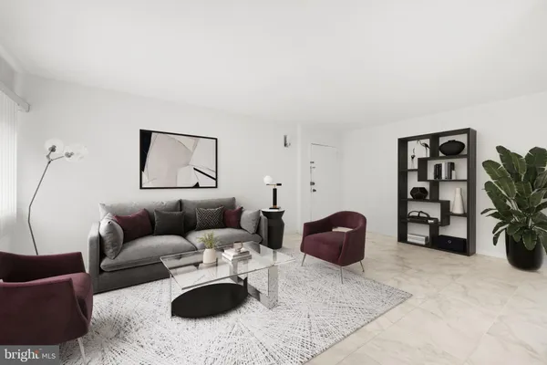 a living room with furniture and a couch