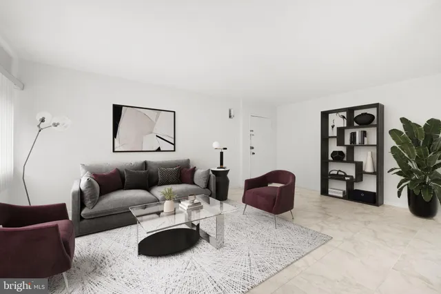 a living room with furniture and a couch