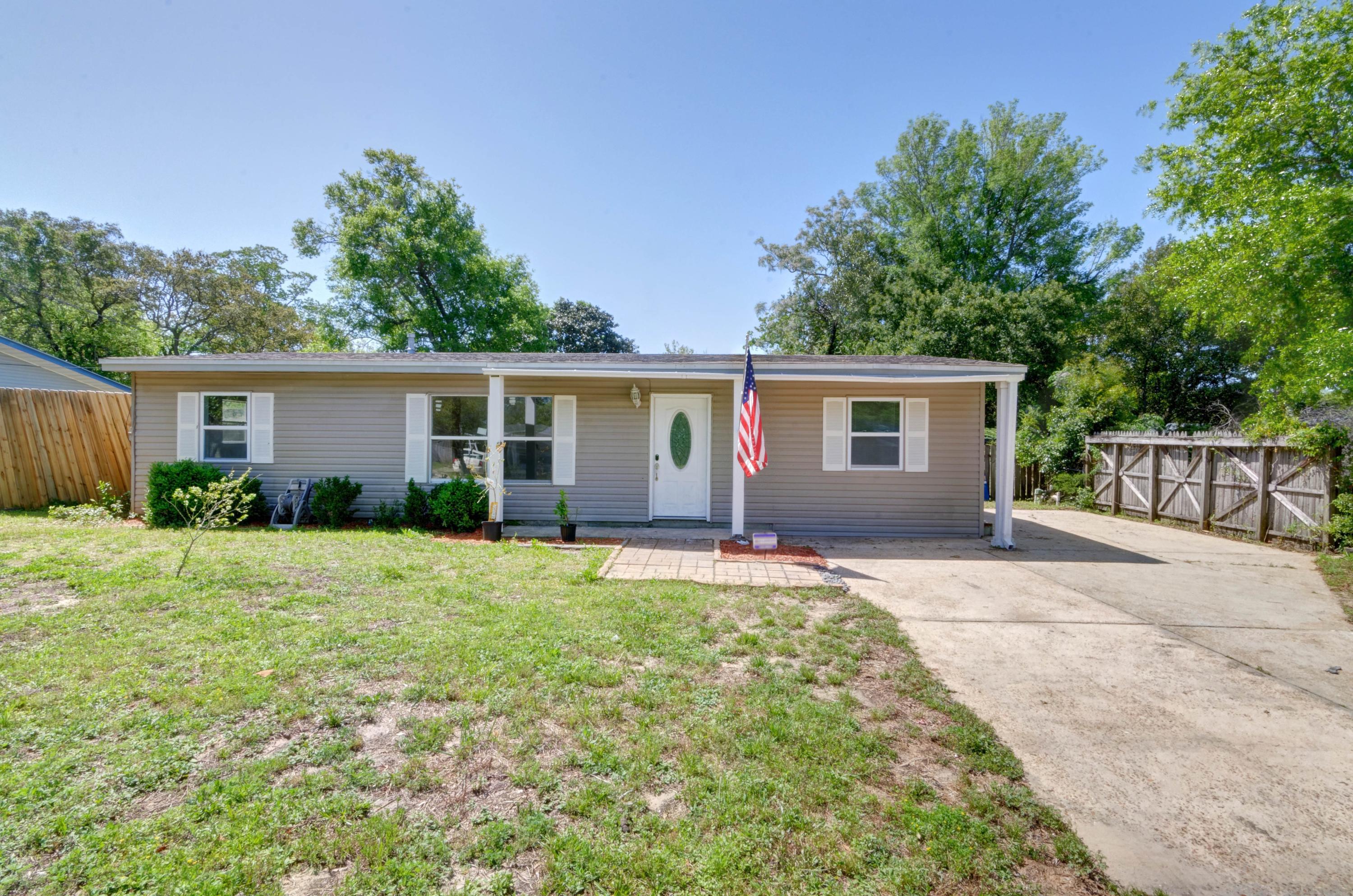 front view of a house and a yard