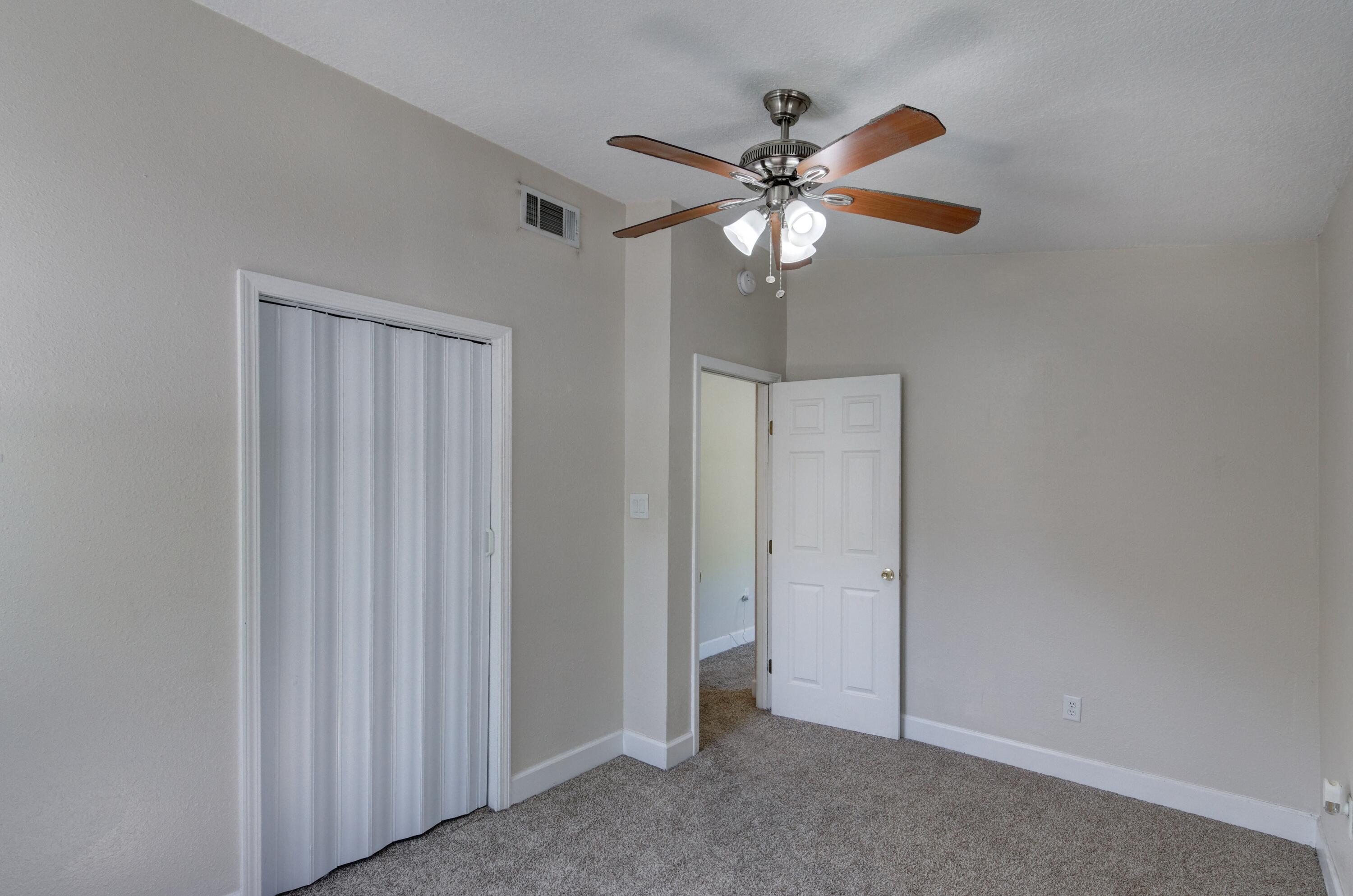419 Westminster Road Fort Walton Beach, FL 32547 - Photo 24 of 40 a view of a chandelier fan in a room
