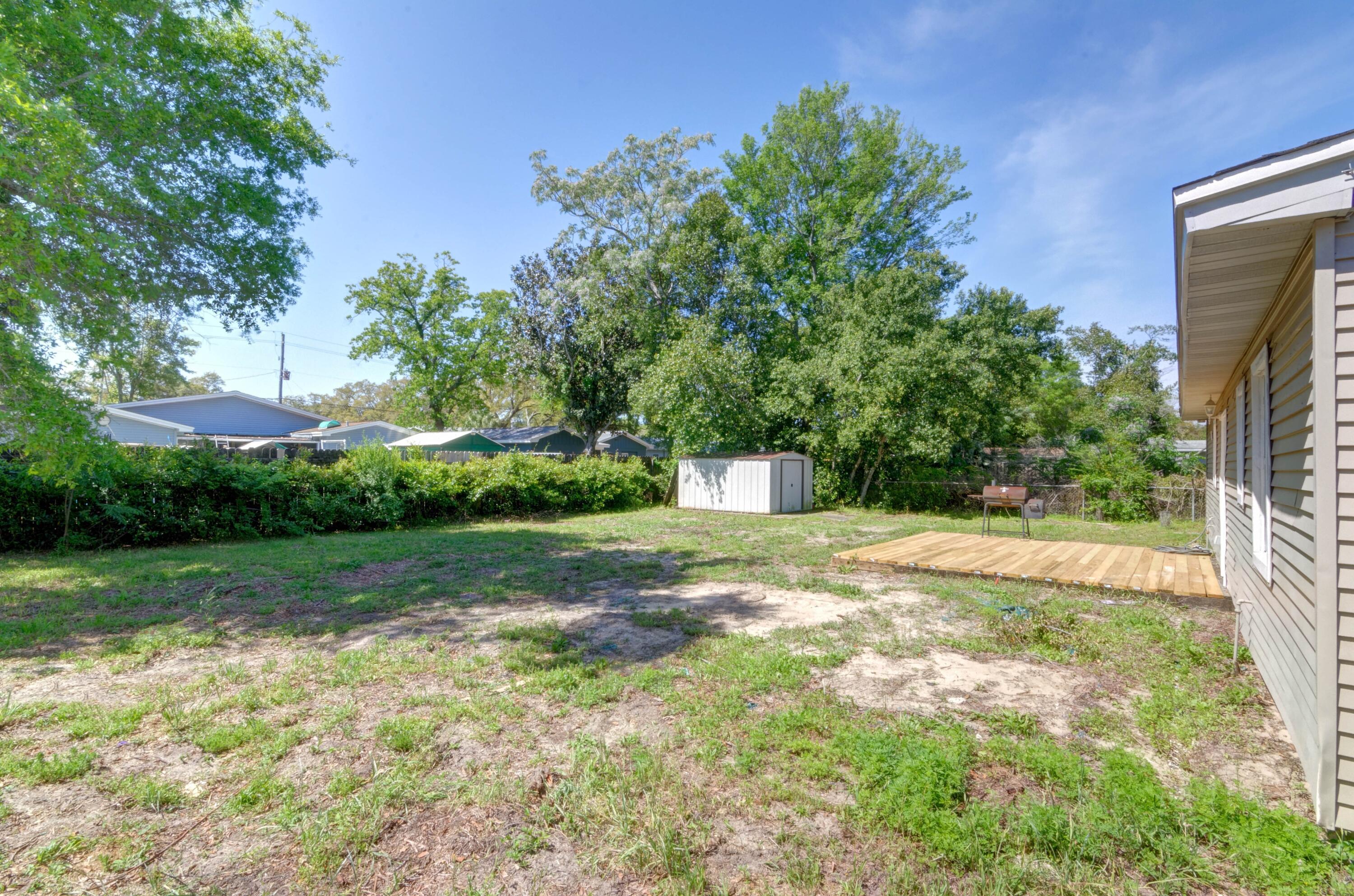 419 Westminster Road Fort Walton Beach, FL 32547 - Photo 31 of 40 a view of a yard with a trees