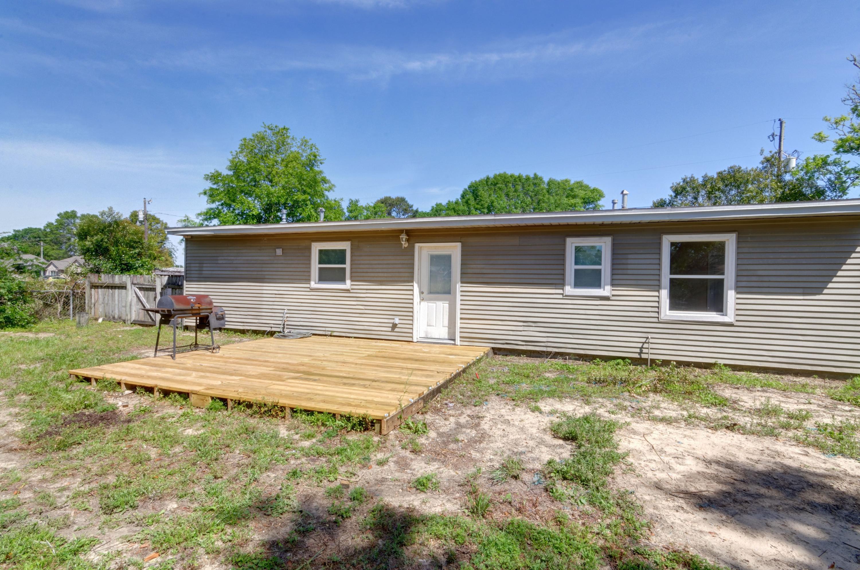 419 Westminster Road Fort Walton Beach, FL 32547 - Photo 33 of 40 a view of a house with a backyard