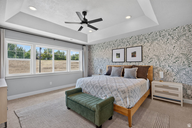 1263 East 1200th South Springville, UT 84663 - Photo 14 of 60 This room features a tray ceiling with recessed lighting and a ceiling fan
