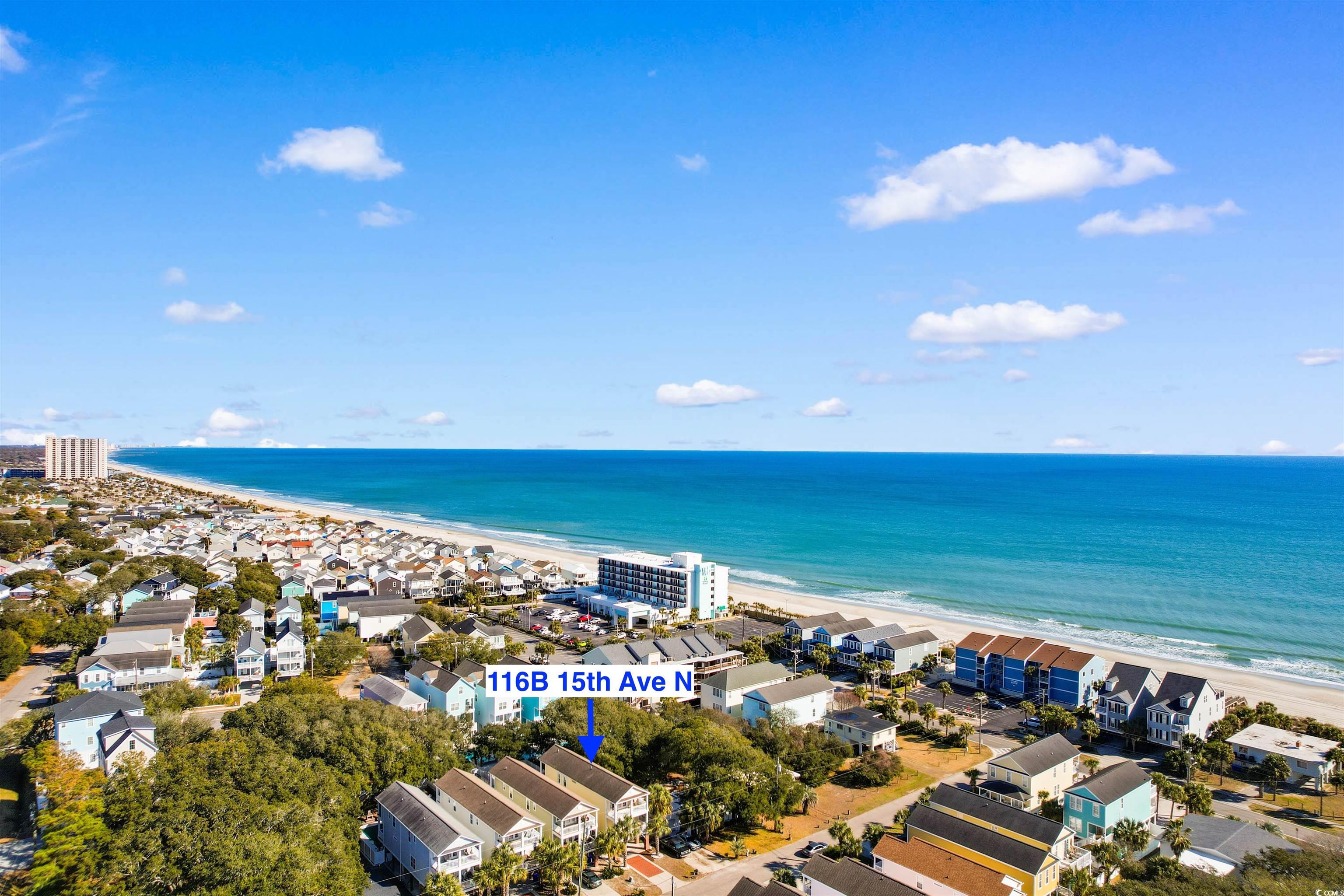 116 B 15th Avenue North Surfside Beach, SC 29575 - Photo 28 of 32 Aerial view featuring a water view and a beach vie