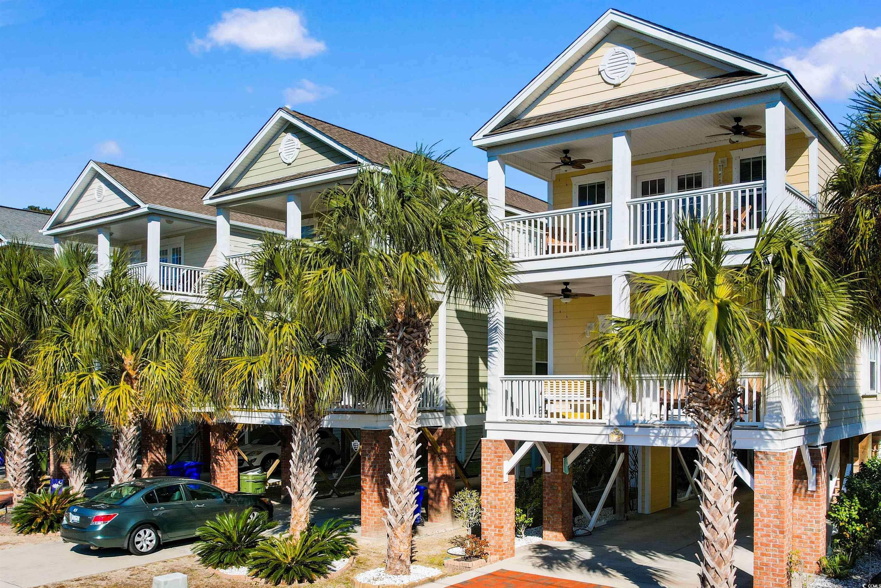 116 B 15th Avenue North Surfside Beach, SC 29575 - Photo 3 of 32 Coastal inspired home featuring ceiling fan, cover