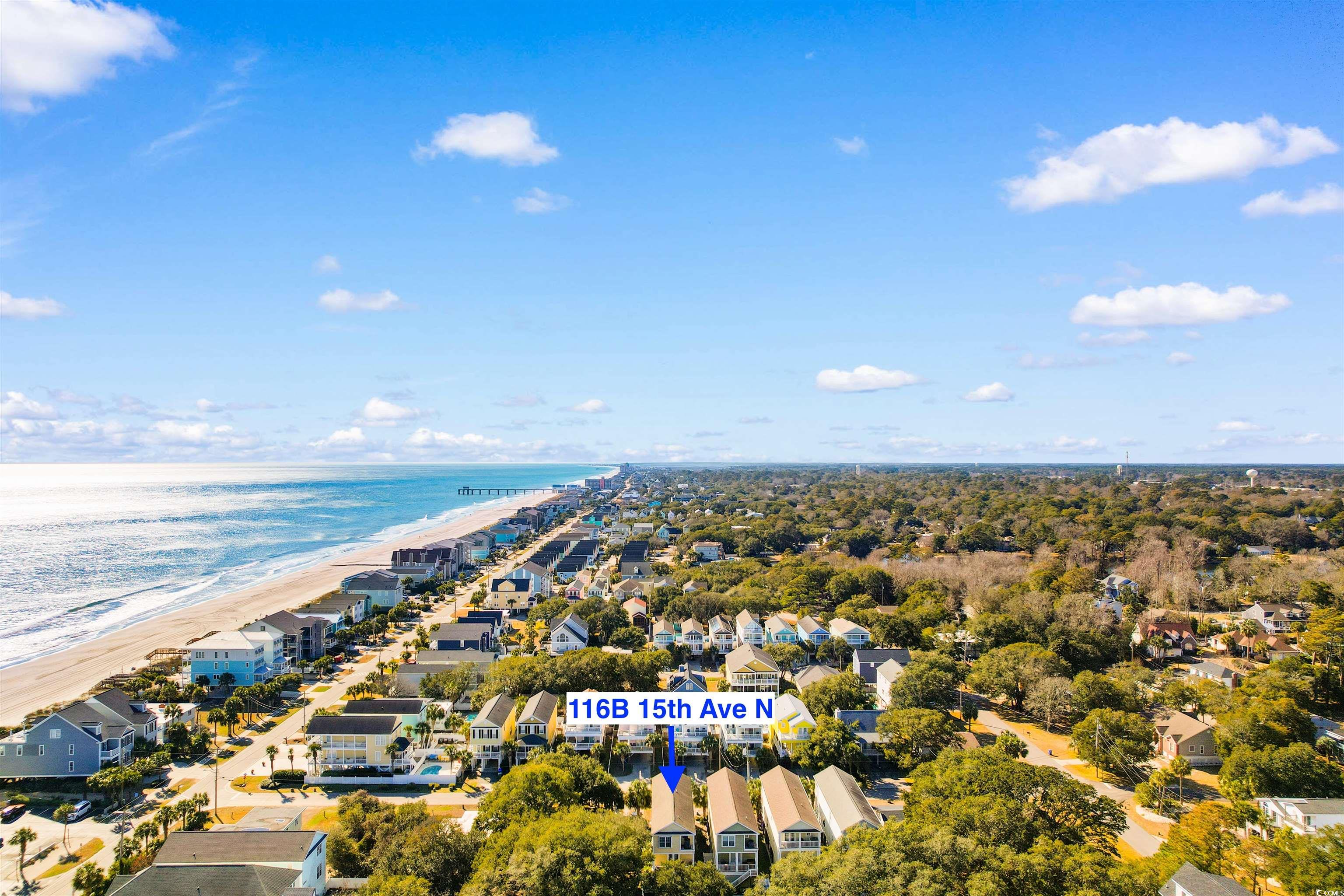 116 B 15th Avenue North Surfside Beach, SC 29575 - Photo 31 of 32 Aerial view with a view of the beach and a water v