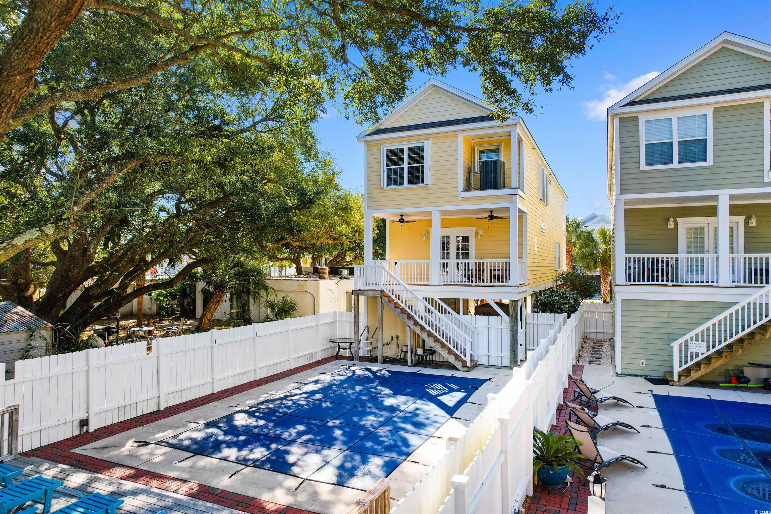 116 B 15th Avenue North Surfside Beach, SC 29575 - Photo 4 of 32 View of inground swimming pool with cover