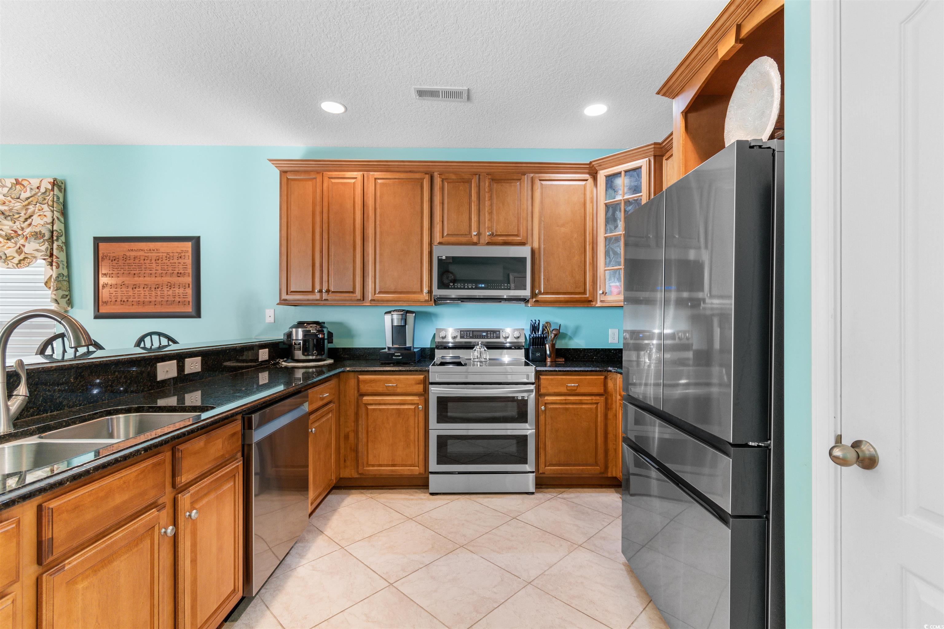 116 B 15th Avenue North Surfside Beach, SC 29575 - Photo 9 of 32 Kitchen featuring stainless steel appliances, dark