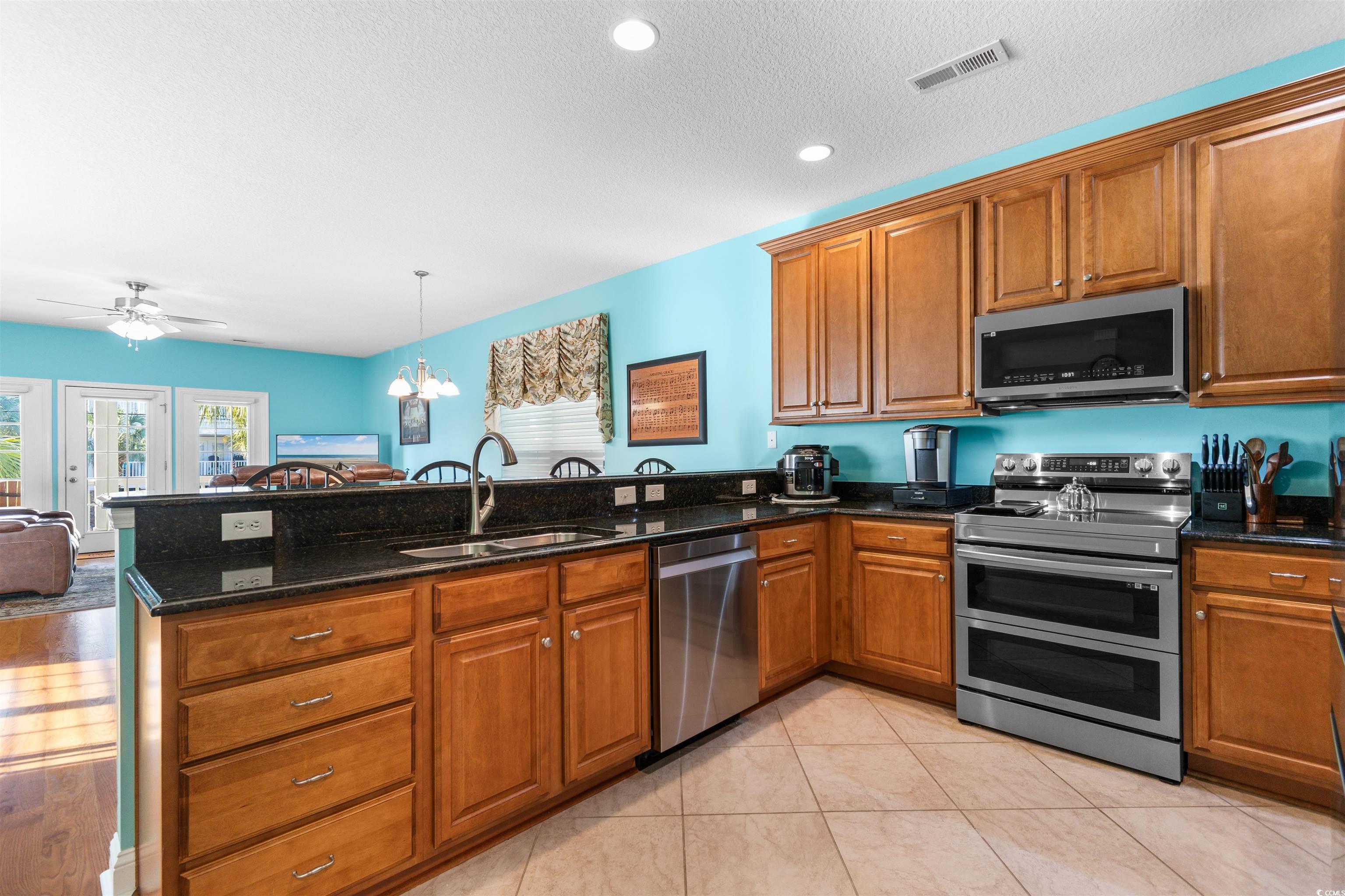 116 B 15th Avenue North Surfside Beach, SC 29575 - Photo 10 of 32 Kitchen with sink, appliances with stainless steel