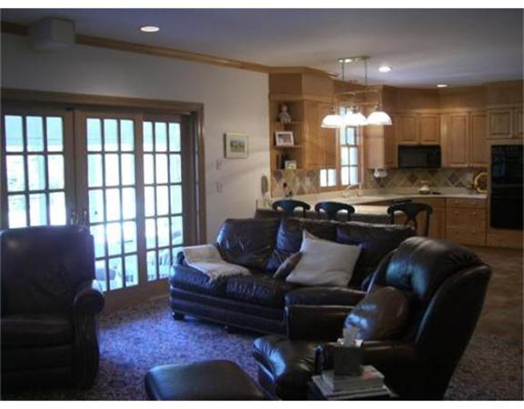 75 Salem Road Topsfield, MA 01983 - Photo 11 of 25 a living room with furniture and a large window