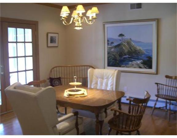 75 Salem Road Topsfield, MA 01983 - Photo 16 of 25 a view of a dining room with furniture a chandelier and wooden floor