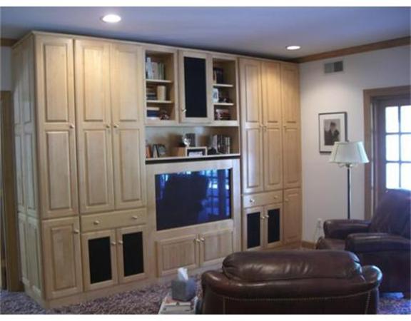 75 Salem Road Topsfield, MA 01983 - Photo 19 of 25 a living room with furniture and a flat screen tv