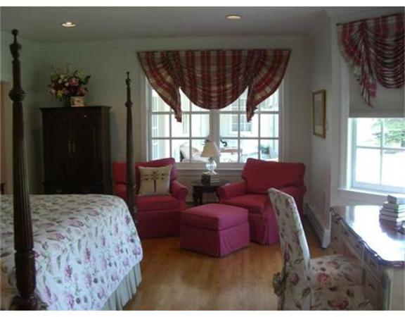 75 Salem Road Topsfield, MA 01983 - Photo 21 of 25 a bedroom with a bed couch and window
