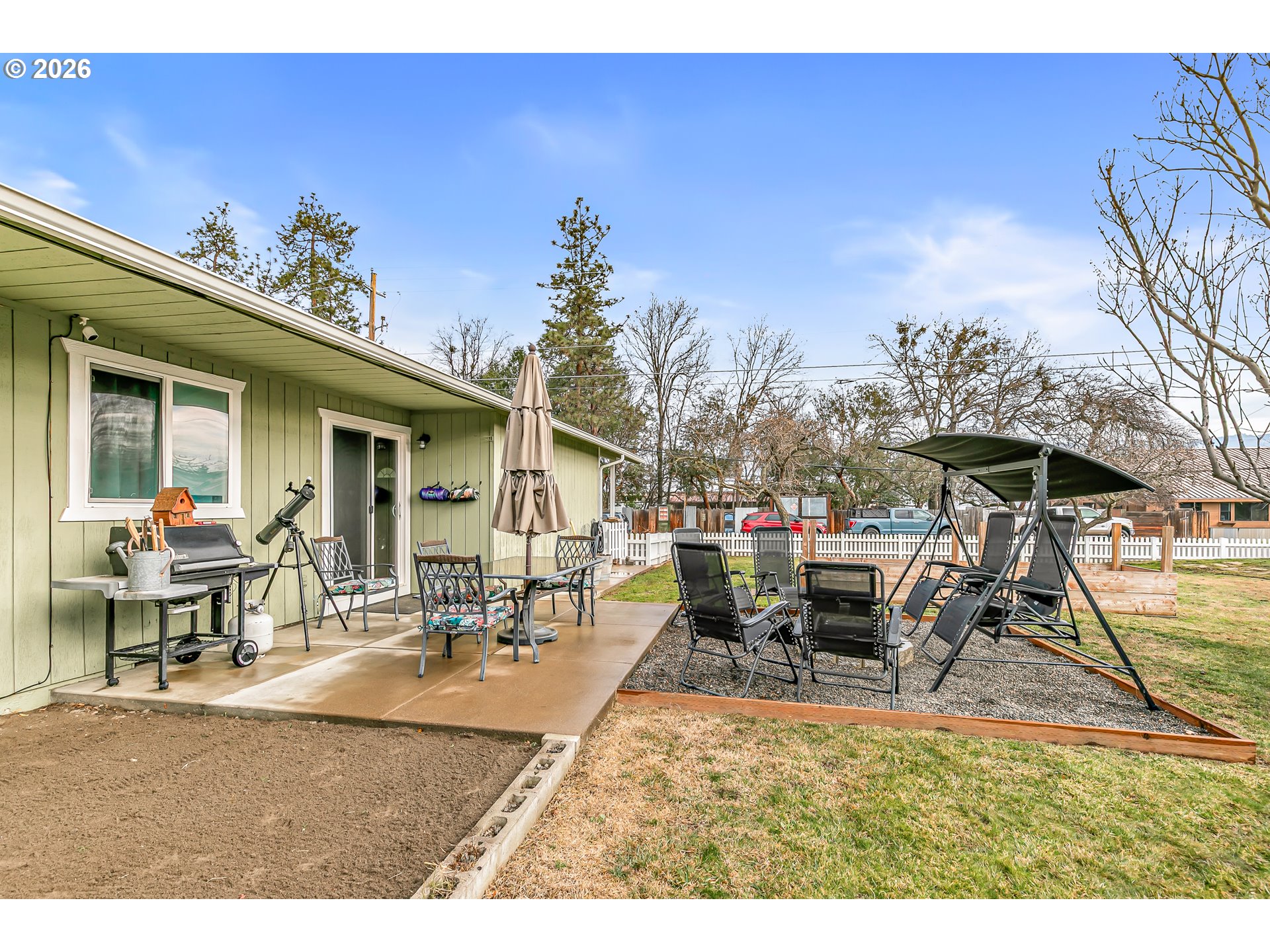 3712 Colver Road Phoenix, OR 97535 - Photo 29 of 38 a view of a patio with table and chairs