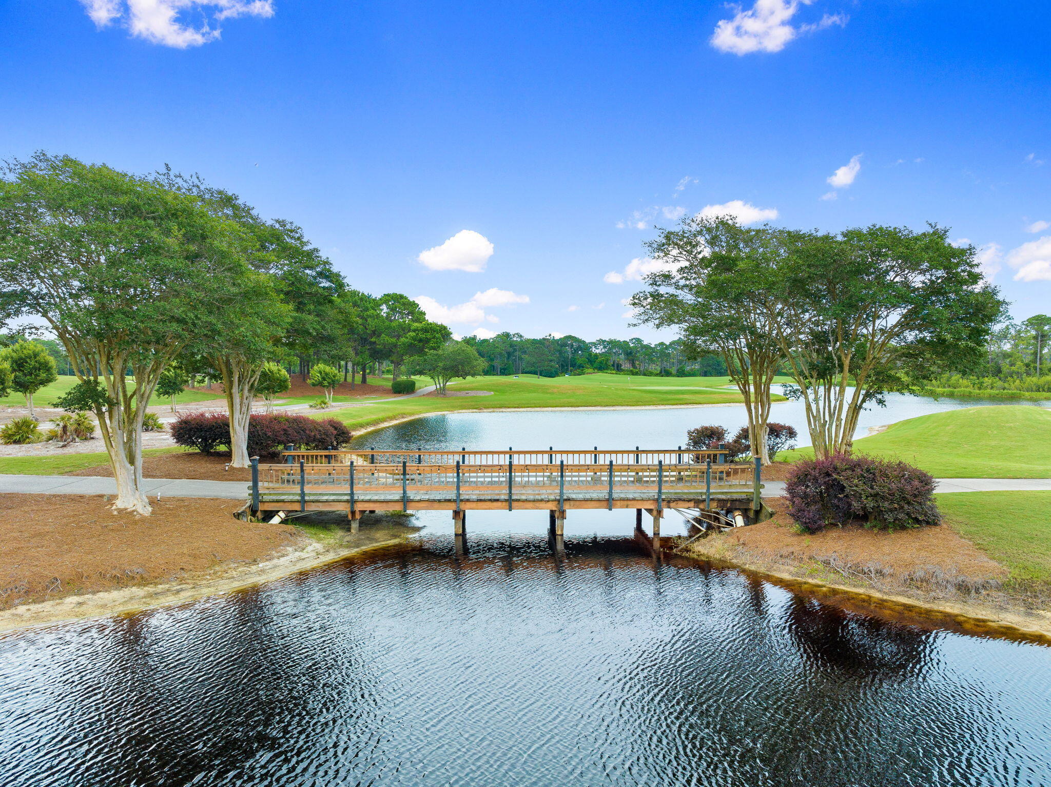 236 Mattie's Way Destin, FL 32541 - Photo 136 of 156 a view of a lake with a patio