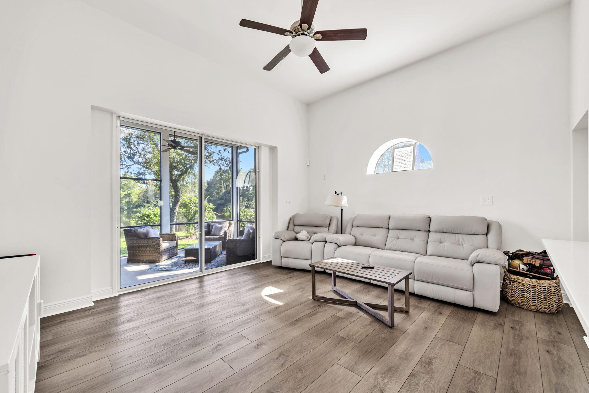 236 Mattie's Way Destin, FL 32541 - Photo 43 of 156 a living room with furniture and a large window