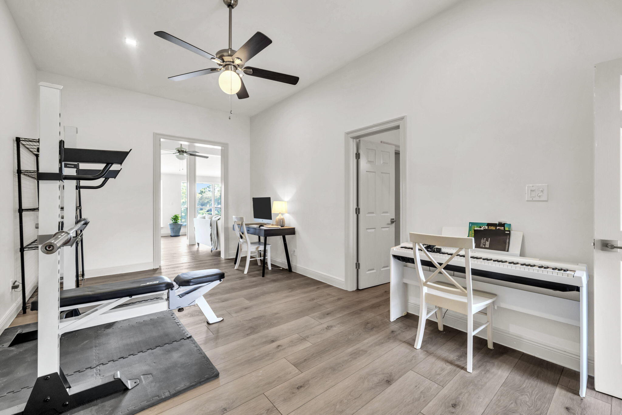 236 Mattie's Way Destin, FL 32541 - Photo 55 of 156 a view of a workspace with furniture and a window