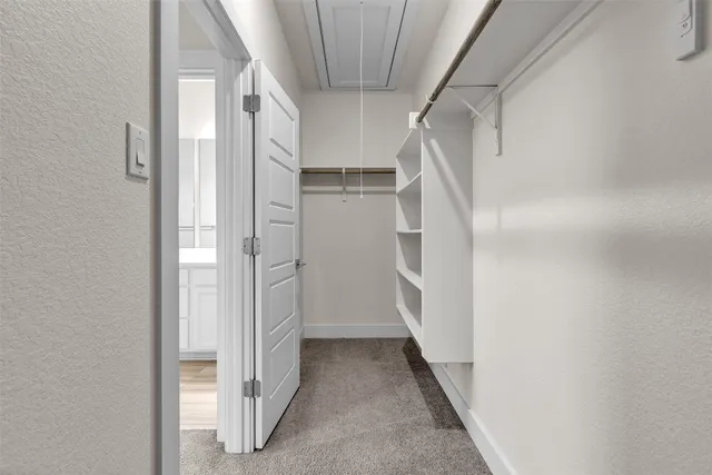 a bathroom with a double vanity sink toilet and shower