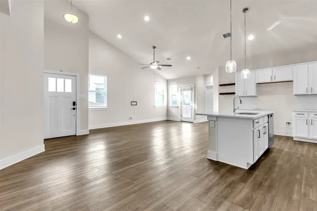 a swimming pool with outdoor seating and yard