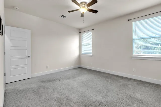 a kitchen with stainless steel appliances kitchen island hardwood floor sink stove and wooden floor