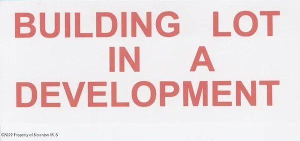 a street sign that is on a wall