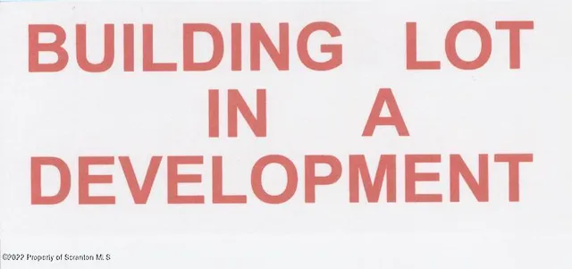 a street sign that is on a wall