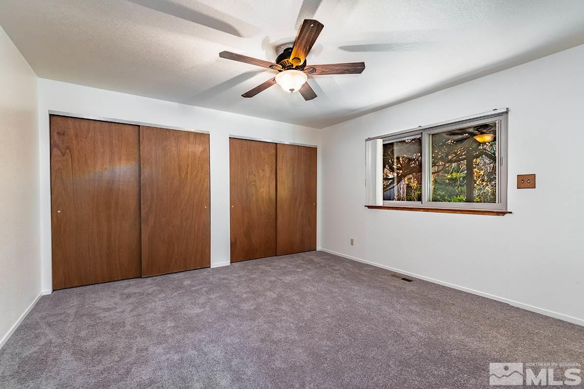 11040 Broken Hill Road Reno, NV 89511 - Photo 15 of 24 a view of an empty room with a window