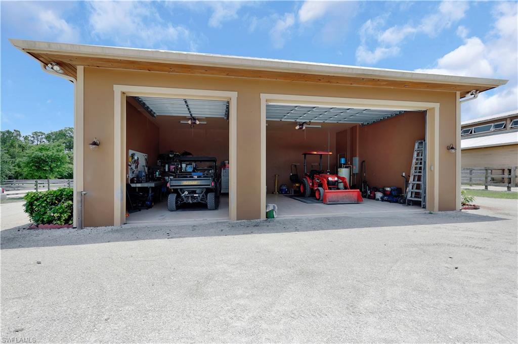 215 Auto Ranch Road Naples, FL 34114 - Photo 13 of 21 a view of a entryway door of the house