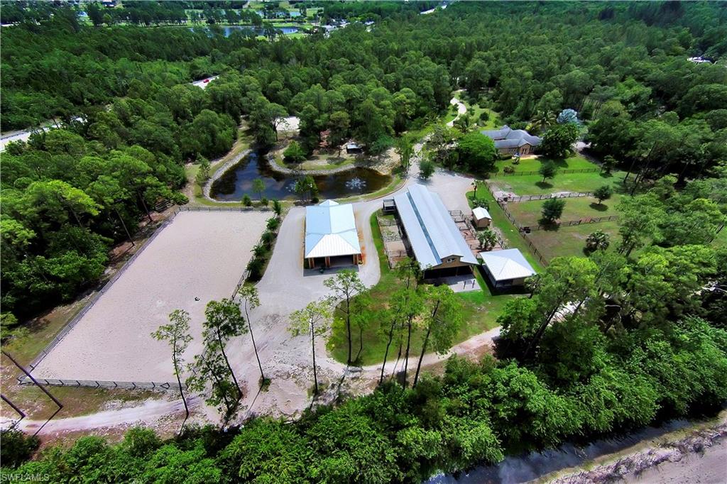 215 Auto Ranch Road Naples, FL 34114 - Photo 18 of 21 an aerial view of a house with outdoor space