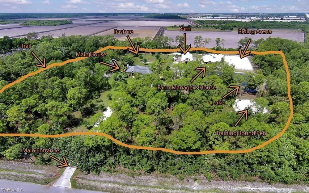 215 Auto Ranch Road Naples, FL 34114 - Photo 21 of 21 an aerial view of a houses with outdoor space and street view