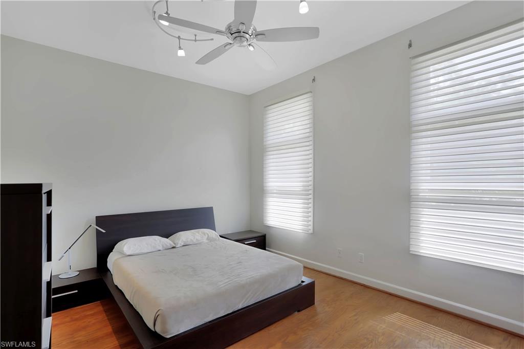 215 Auto Ranch Road Naples, FL 34114 - Photo 3 of 21 a bedroom with a bed and window