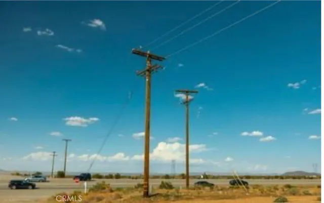 a view of a lake and a yard