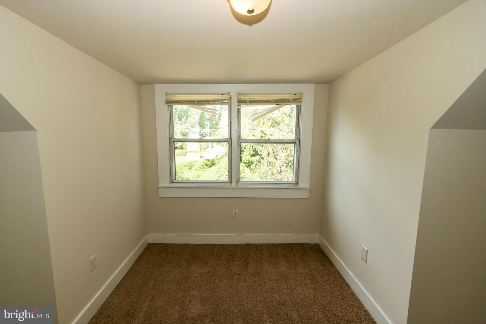 3607 Windsor Mill Road Baltimore, MD 21216 - Photo 17 of 25 an empty room with window