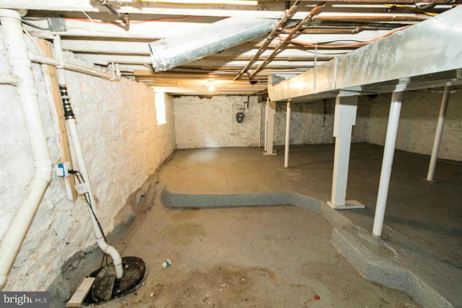 3607 Windsor Mill Road Baltimore, MD 21216 - Photo 22 of 25 a view of a room with wooden walls