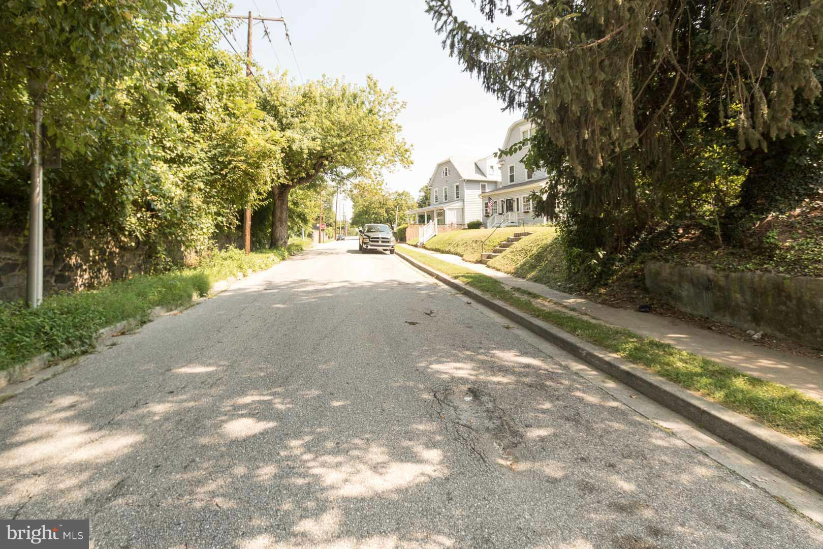 3607 Windsor Mill Road Baltimore, MD 21216 - Photo 24 of 25 a view of yard with large trees