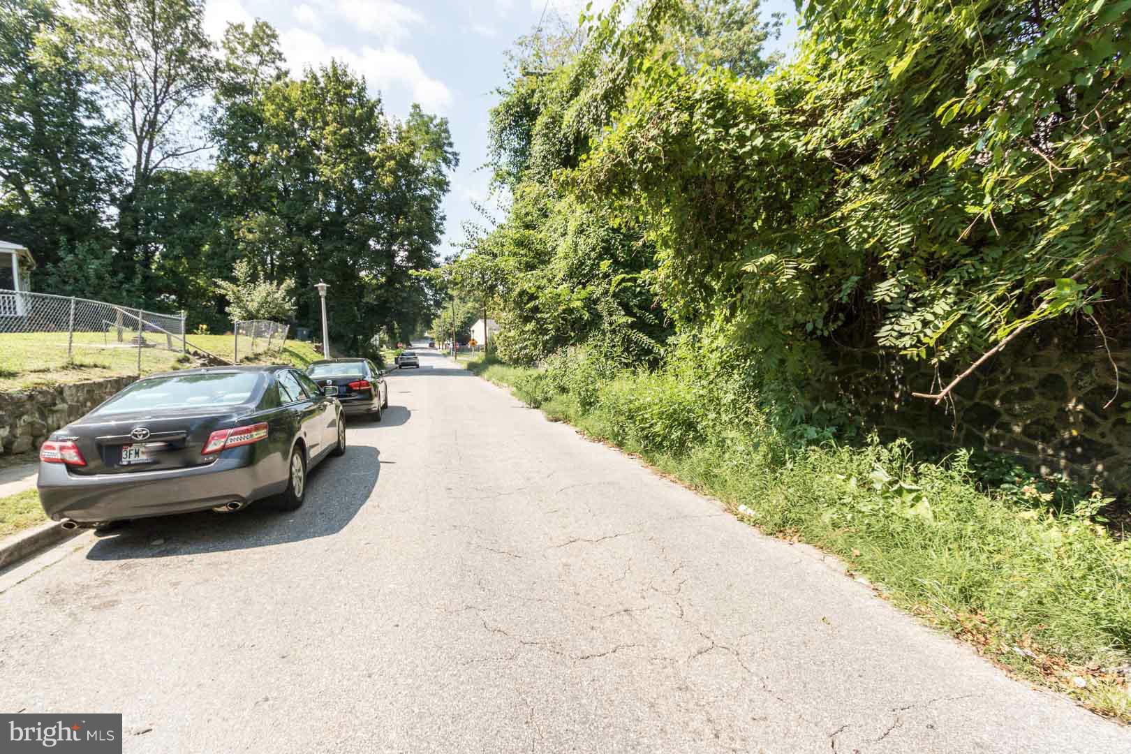 3607 Windsor Mill Road Baltimore, MD 21216 - Photo 25 of 25 a view of cars parked on the road