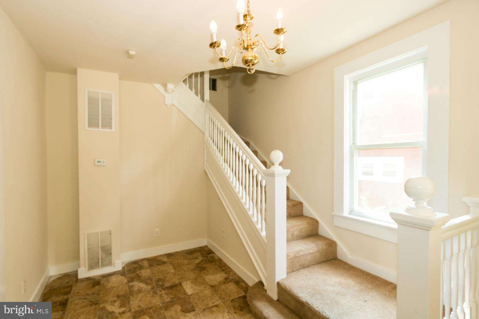 3607 Windsor Mill Road Baltimore, MD 21216 - Photo 4 of 25 a view of a livingroom with a window