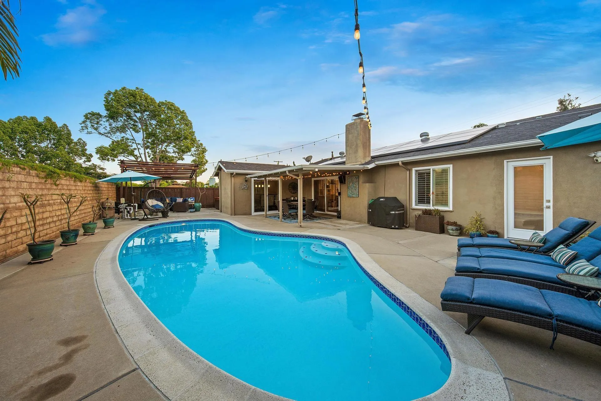 14161 Halper Road Poway, CA 92064 - Photo 56 of 64 a view of a house with swimming pool