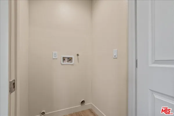 a view of livingroom with hardwood floor and a ceiling fan