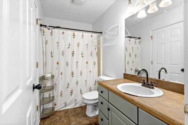 500 Berry Circle Springfield, TN 37172 - Photo 15 of 27 a bathroom with a sink toilet double vanity and shower