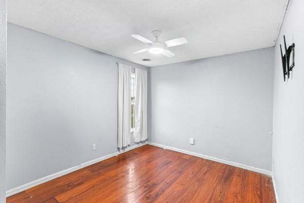 500 Berry Circle Springfield, TN 37172 - Photo 18 of 27 a view of an empty room with window and wooden floor