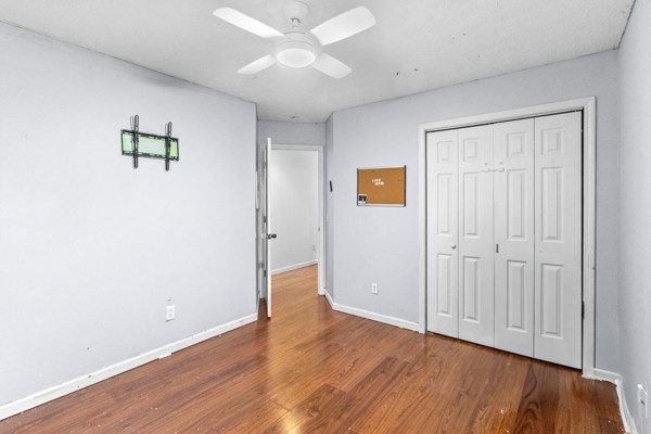 500 Berry Circle Springfield, TN 37172 - Photo 19 of 27 an empty room with wooden floor closet and windows