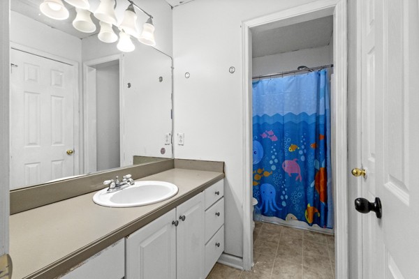 500 Berry Circle Springfield, TN 37172 - Photo 20 of 27 a bathroom with a sink vanity granite tub shower and a mirror