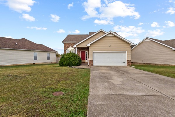 500 Berry Circle Springfield, TN 37172 - Photo 2 of 27 a view of a house with a yard and large tree