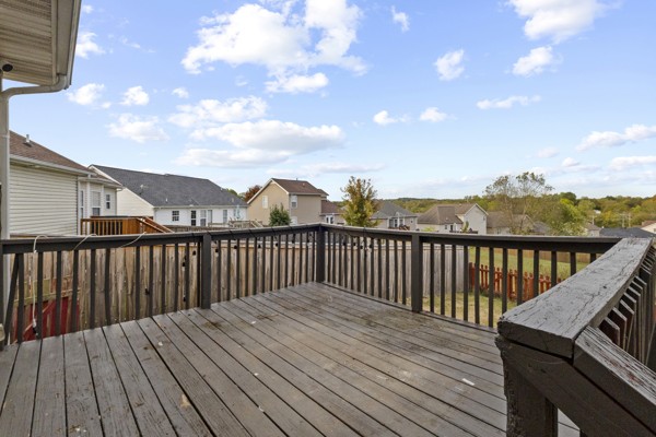 500 Berry Circle Springfield, TN 37172 - Photo 22 of 27 a balcony with wooden floor and city view