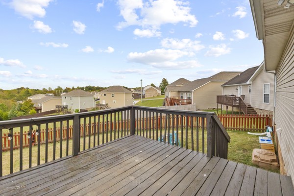 500 Berry Circle Springfield, TN 37172 - Photo 23 of 27 a view of balcony with wooden floor and fence