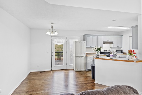 500 Berry Circle Springfield, TN 37172 - Photo 9 of 27 a kitchen with stainless steel appliances a refrigerator and a stove top oven