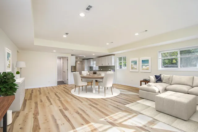 a living room with furniture and a table